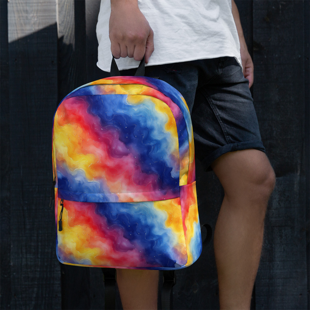 Backpack with vibrant rainbow galaxy gradient watercolor design featuring cosmic purple and bright rainbow color transitions