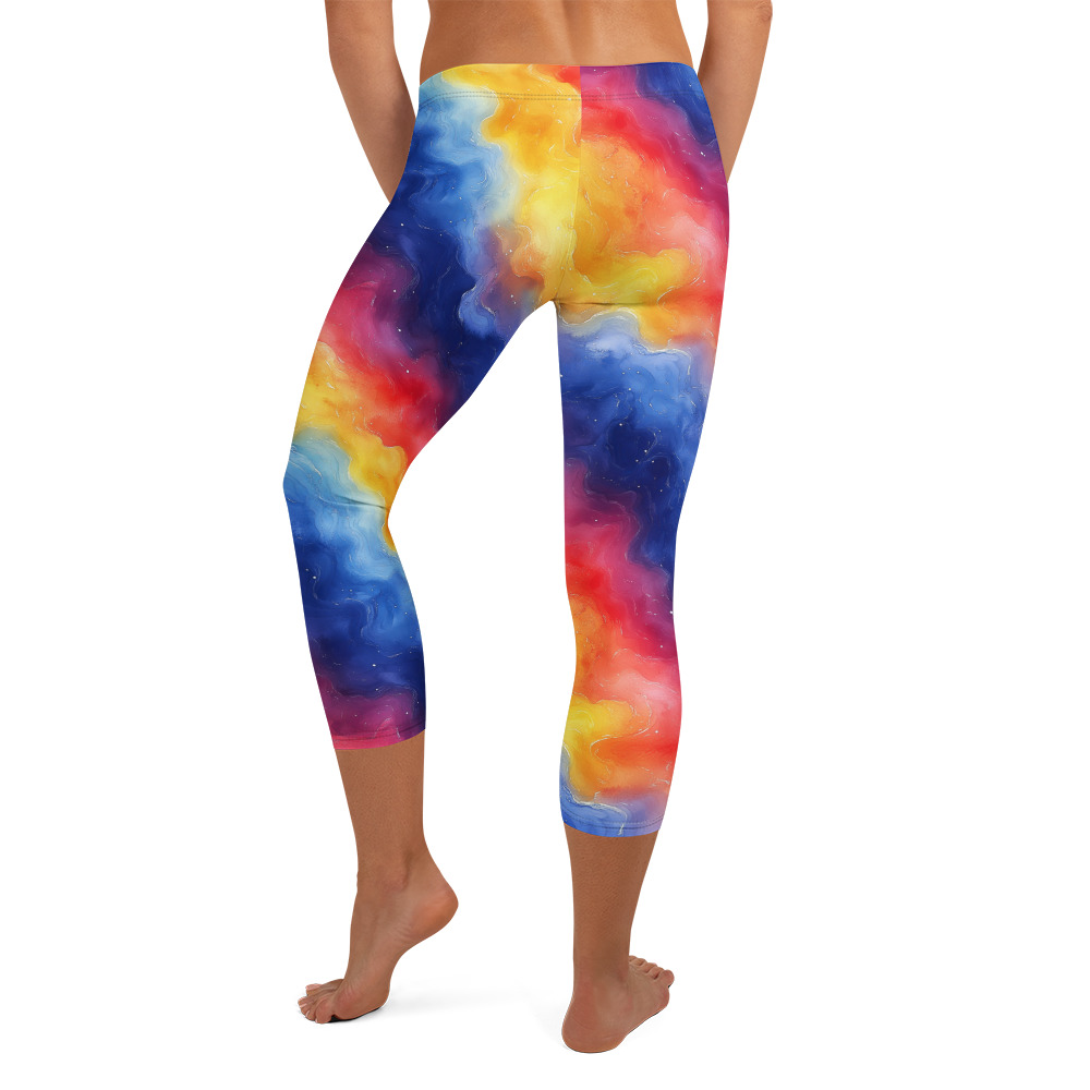 Capri leggings featuring vibrant rainbow galaxy gradient design in watercolor style with cosmic celestial patterns