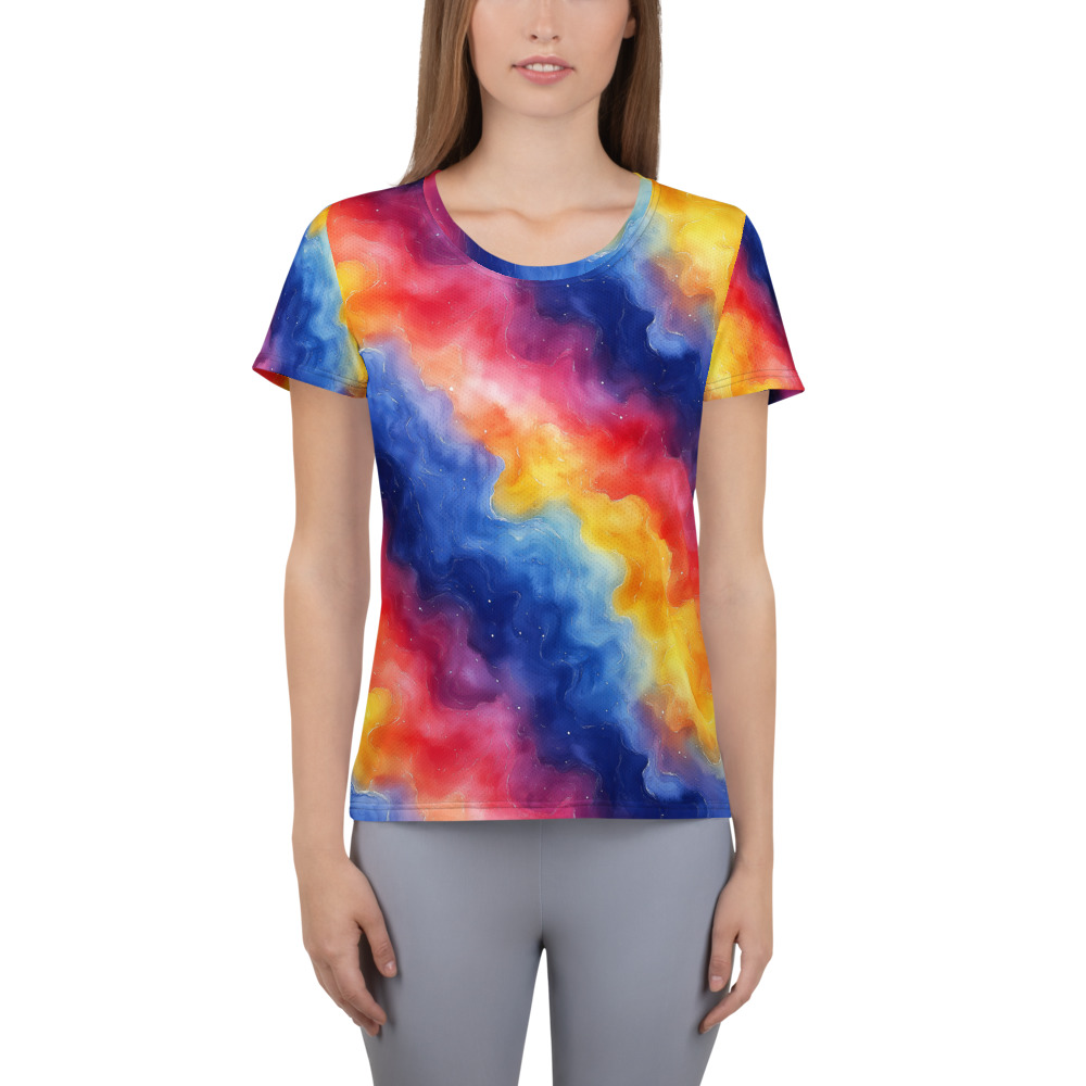 Women's athletic t-shirt with vibrant rainbow galaxy watercolor gradient design in cosmic celestial pattern