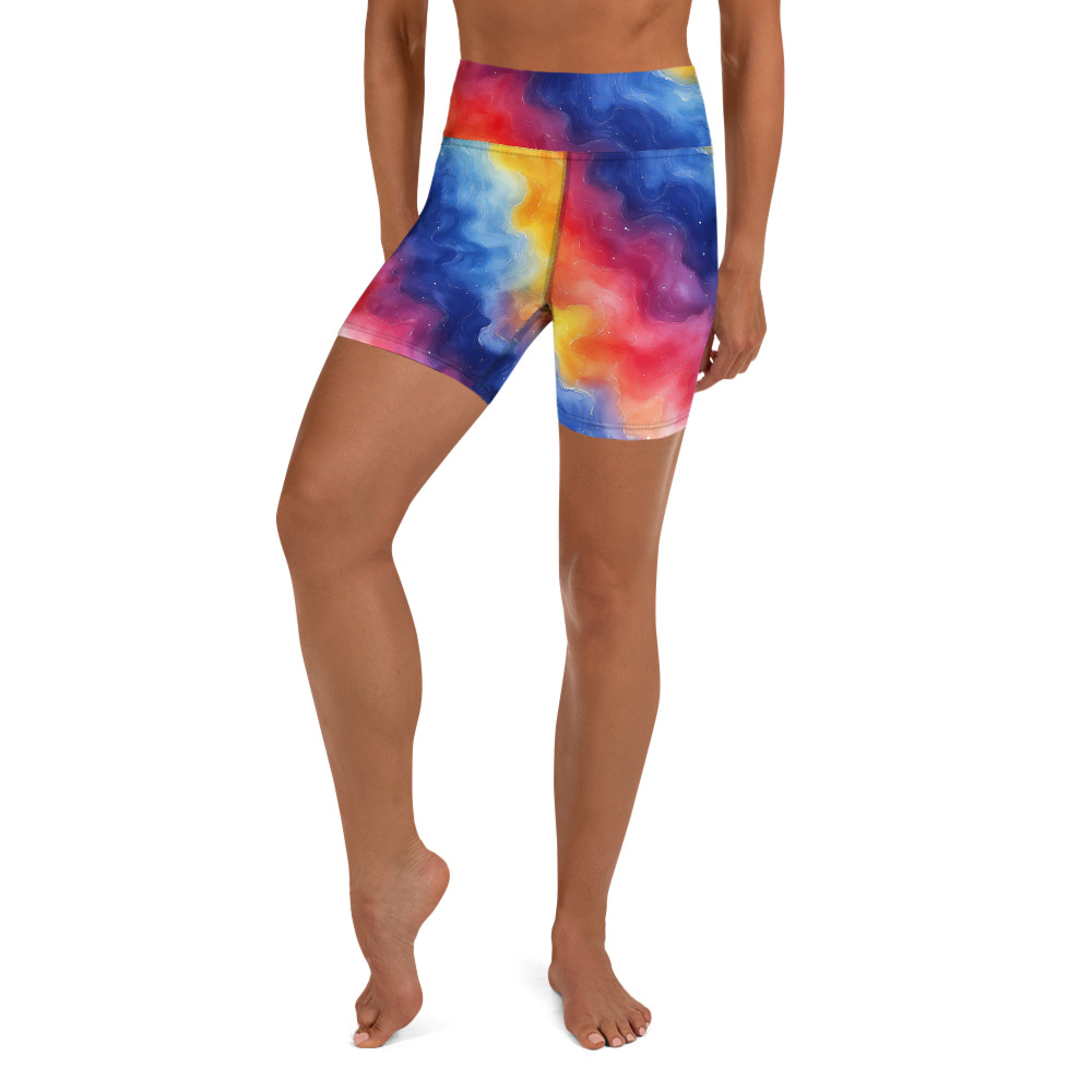 Yoga shorts with vibrant rainbow galaxy gradient watercolor design featuring cosmic purple, pink, orange and blue hues
