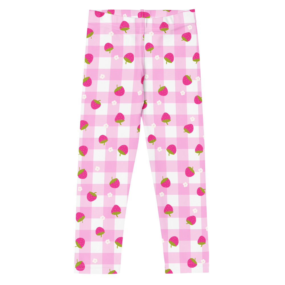 Kids leggings with pink gingham background and scattered strawberry ditsy pattern in cute vintage style