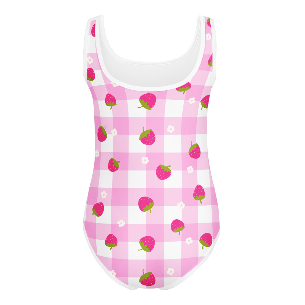 Kids swimsuit featuring pink gingham pattern with small strawberry ditsy print design in cute checkered style