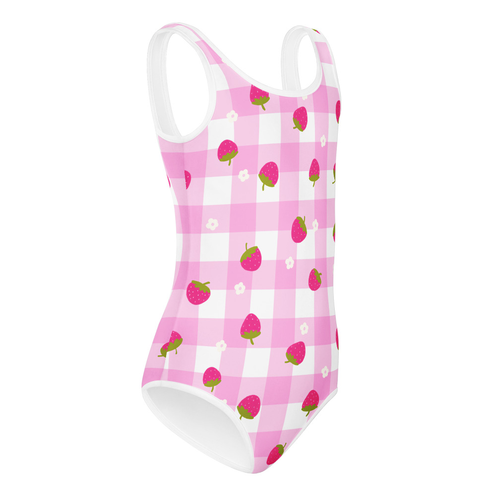 Kids swimsuit featuring pink gingham pattern with small strawberry ditsy print design in cute checkered style