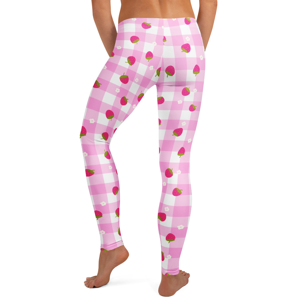 Pink gingham leggings with small strawberry ditsy pattern and elastic waistband showing cute vintage-inspired design