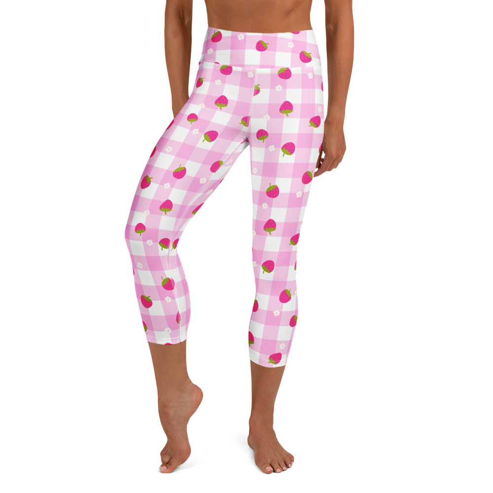 Pink gingham yoga capri leggings with scattered strawberry pattern, mid-calf length, high waistband design