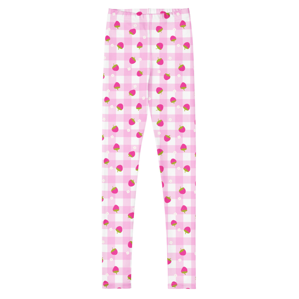 Youth leggings with pink gingham pattern featuring small strawberry design scattered across fabric