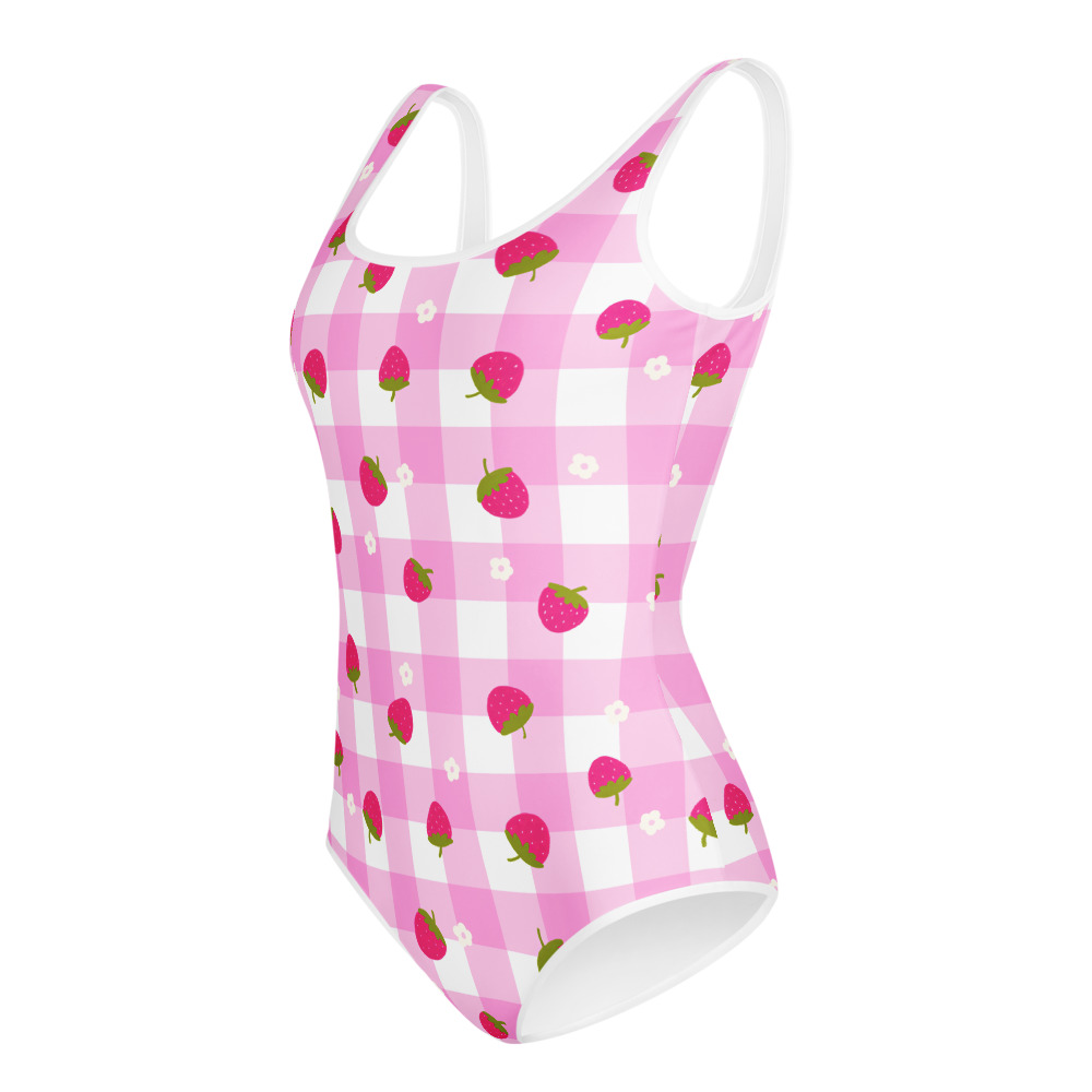Youth swimsuit featuring pink gingham pattern with small strawberry ditsy motifs in cute gingham design style