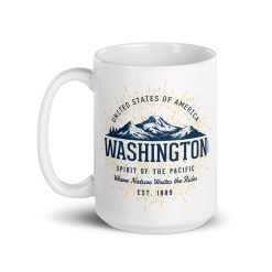 A white 15oz ceramic mug featuring a vintage-style graphic of Washington State mountains and the slogan "SPIRIT OF THE PACIFIC."