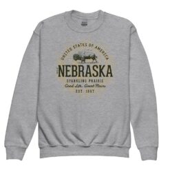 Youth crewneck sweatshirt featuring retro Nebraska state design with vintage typography and prairie-inspired graphics