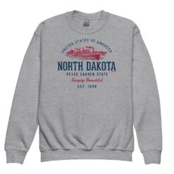 Youth crewneck sweatshirt displaying vintage-style North Dakota state design with retro typography and classic prairie imagery