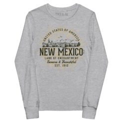 Youth long sleeve shirt displaying retro New Mexico state design with vintage-inspired typography and southwestern elements