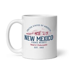 White ceramic coffee mug with colorful retro New Mexico State design featuring southwestern artwork and vintage-style typography