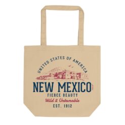 Organic cotton tote bag displaying retro New Mexico State design with vintage-inspired southwestern artwork and typography